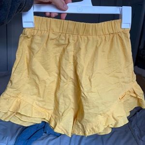 Princess Polly yellow shorts